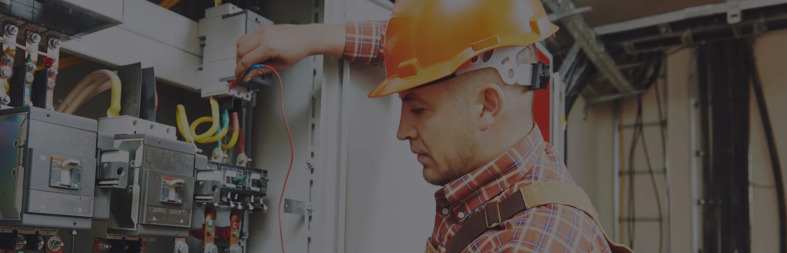 Electrician working on electrical infrastructure